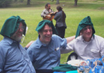 Fritz Baesman, Dave Wilon & Val Paulson with stylish napkin hats